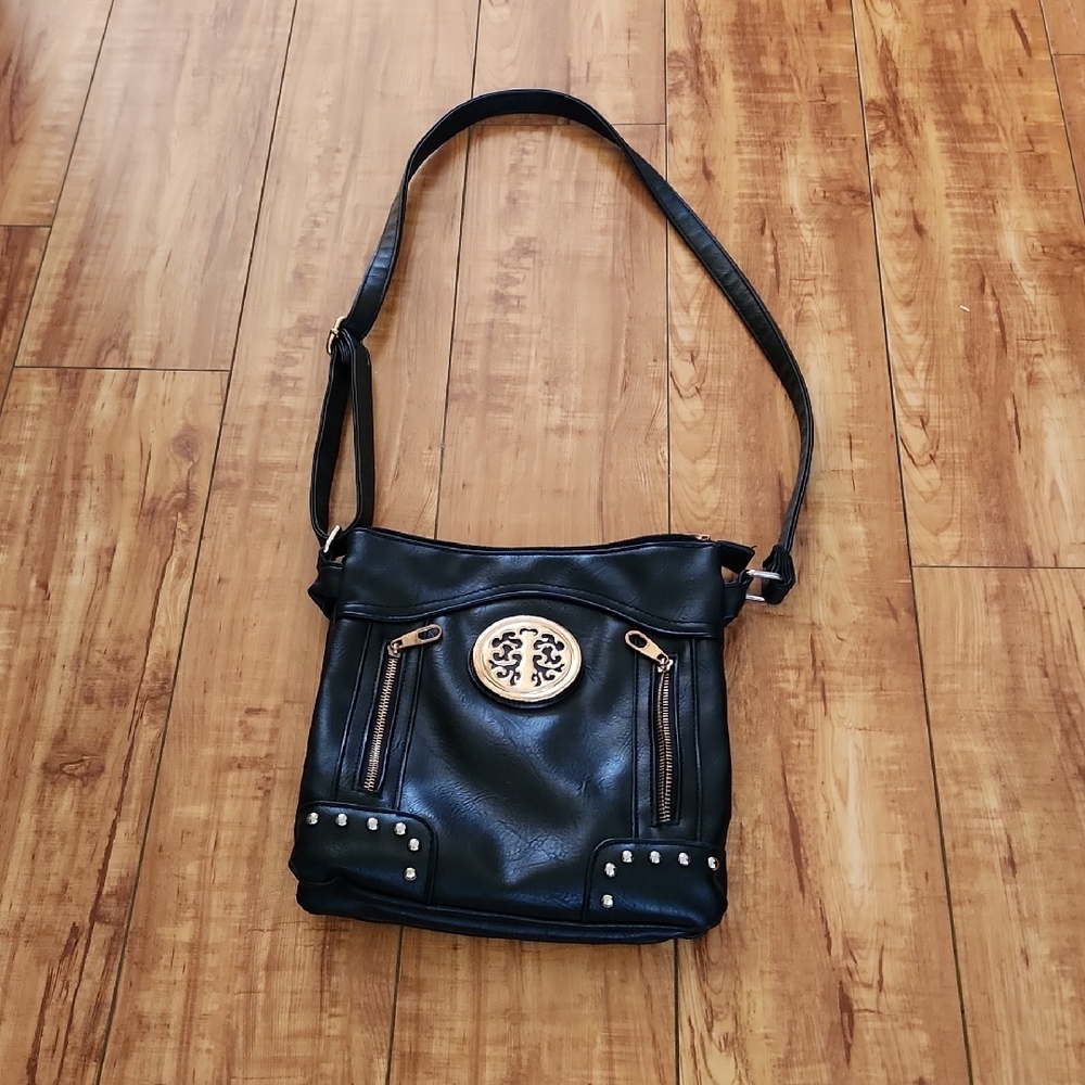 Black and Gold Crossbody Bag with Structured Design